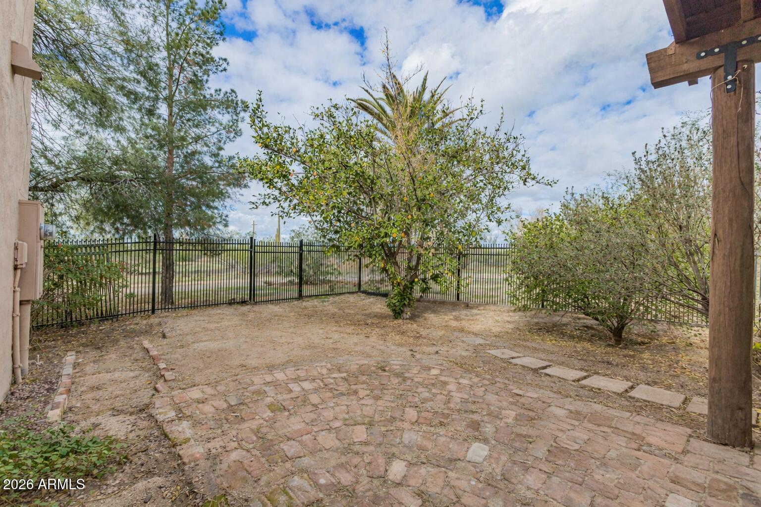 8714 North Dead Mans Gulch Road Florence, AZ 85132 - Photo 26 of 39 a view of a yard with a tree