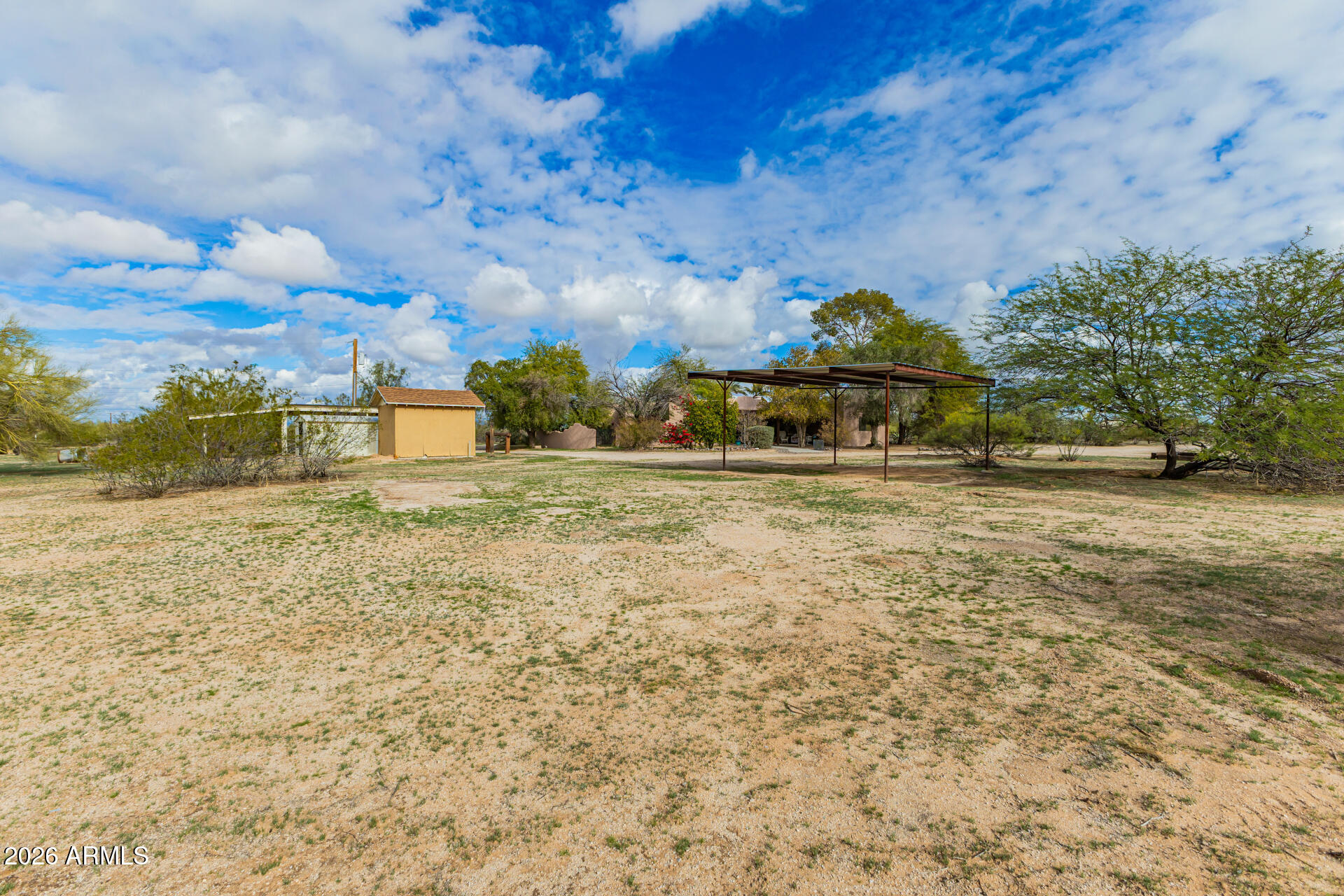 8714 North Dead Mans Gulch Road Florence, AZ 85132 - Photo 30 of 39 a view of a yard with a house