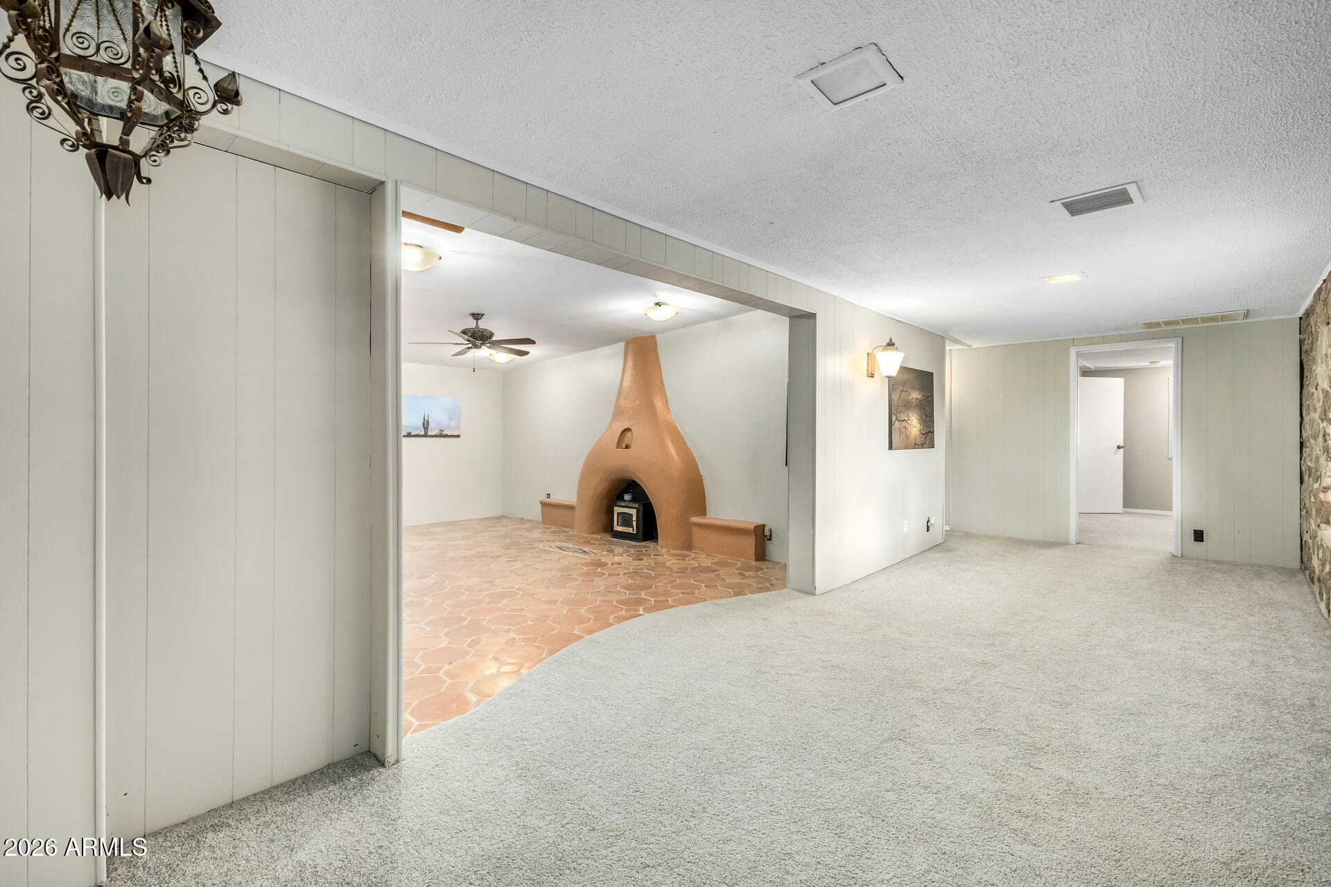 8714 North Dead Mans Gulch Road Florence, AZ 85132 - Photo 4 of 39 a view of a livingroom with a chandelier