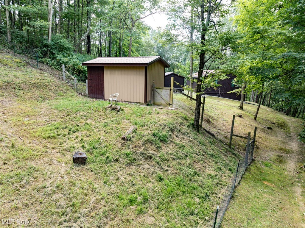 34390 Barber Ridge Road Lewisville, OH 43754 - Photo 5 of 50 View of yard with an outdoor structure
