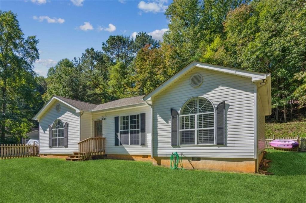 3003 Mohawk Drive Gainesville, GA 30501 - Photo 1 of 1 a front view of a house with a yard