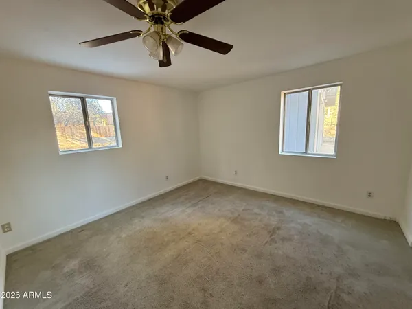 a view of hallway with a window