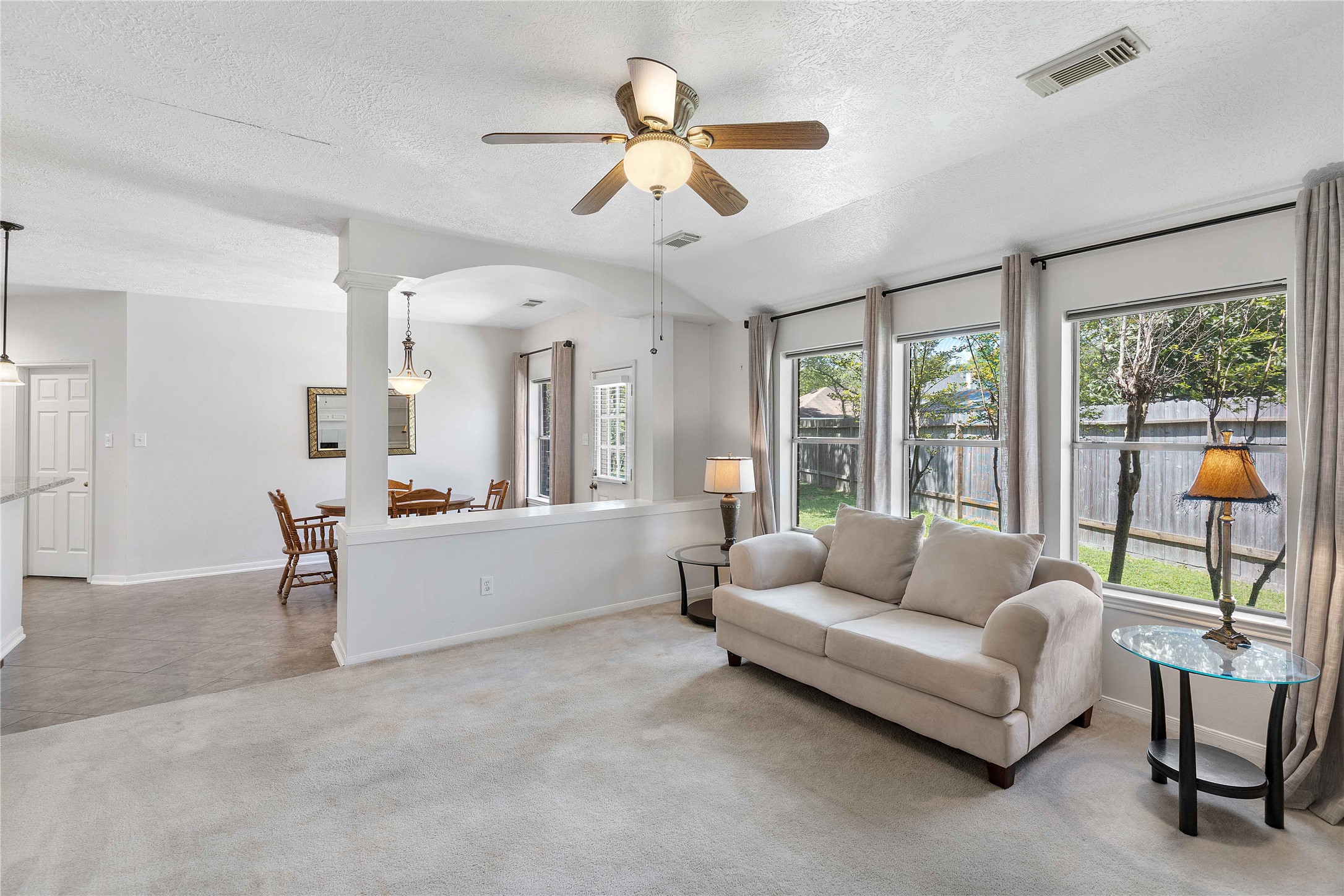 1707 Moston Drive Spring, TX 77386 - Photo 19 of 41 a living room with furniture and a large window