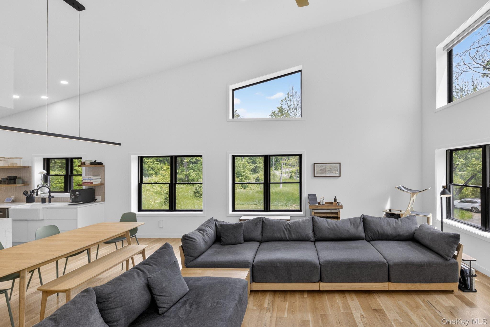 739 Old Post Road New Paltz, NY 12561 - Photo 16 of 47 Vaulted ceilings enhance this open-concept living area with abundant natural light