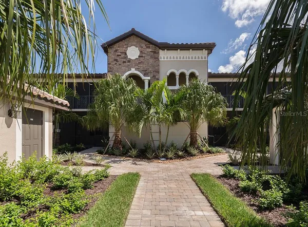 a view of a building with a garden