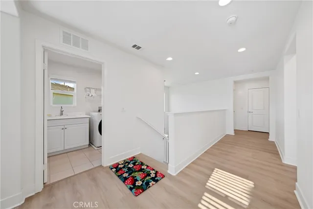 a very nice looking room with a white furniture