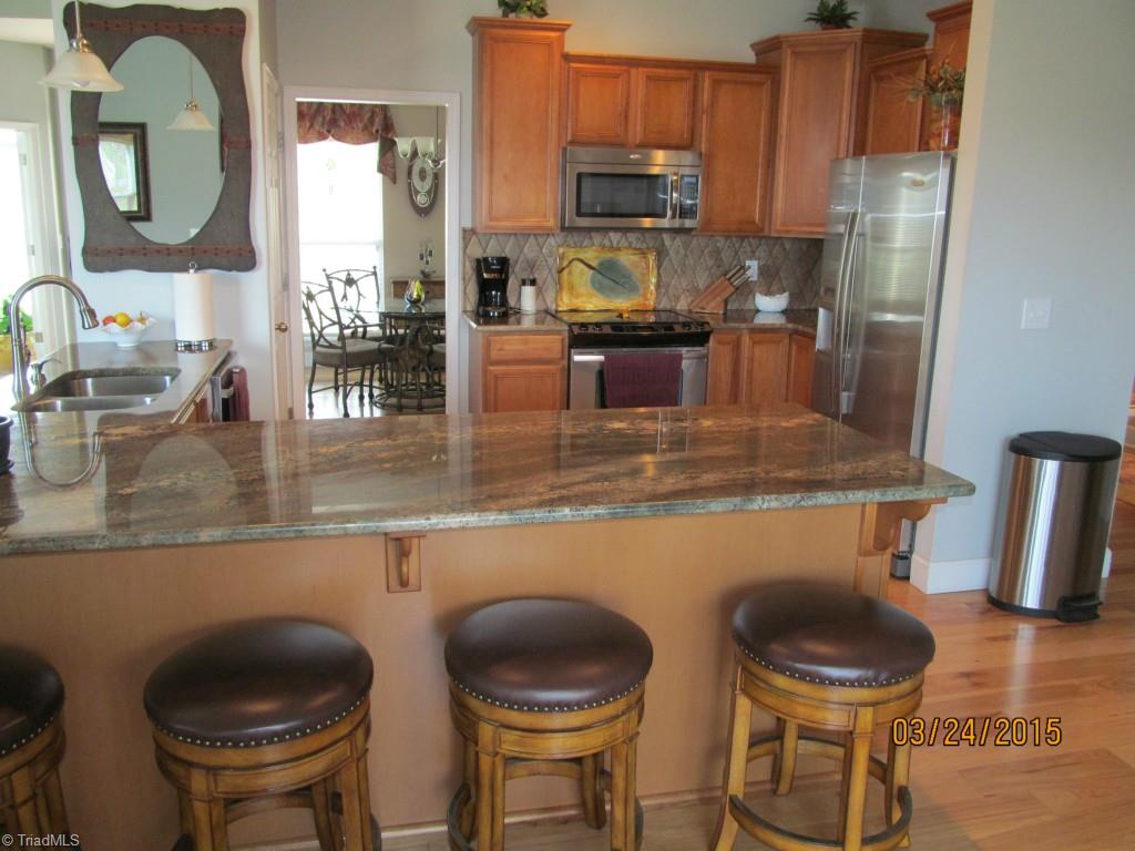 286 Red Brush Road Mount Airy, NC 27030 - Photo 14 of 30 Kitchen/Great Room - Refrig, M/W, Stove, & D/W Stay.