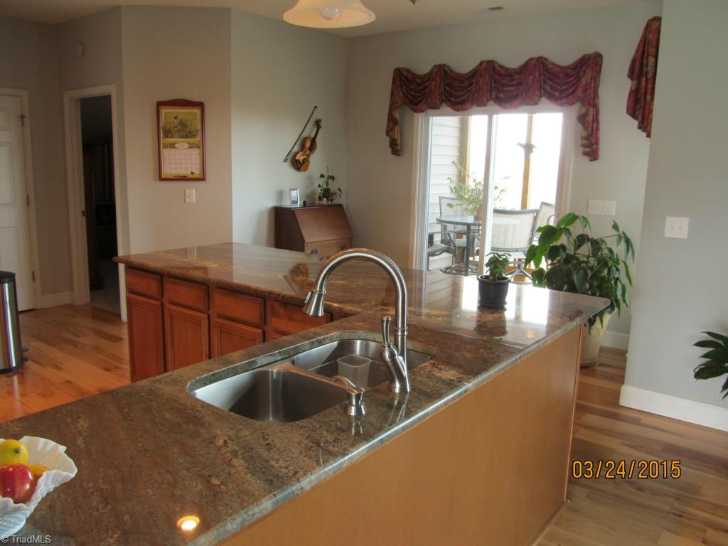 286 Red Brush Road Mount Airy, NC 27030 - Photo 16 of 30 Kitchen/Great Room - Sliding Glass Doors That Go Out To Screened In Back Deck.