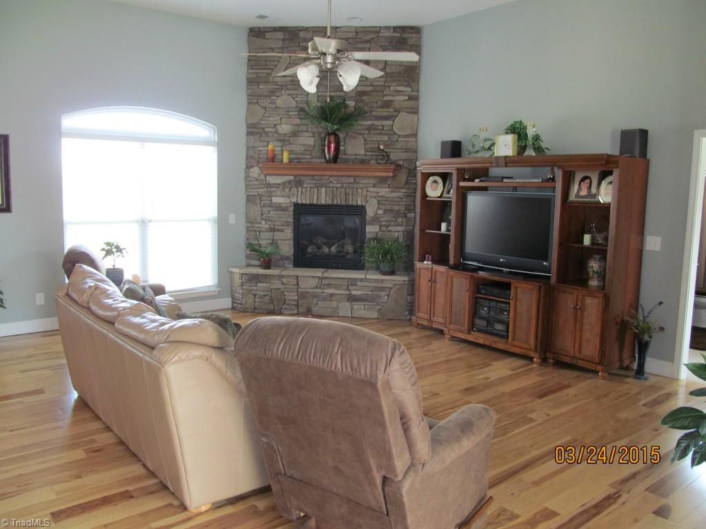 286 Red Brush Road Mount Airy, NC 27030 - Photo 10 of 30 Living Room w/ Stone Fireplace, Custom Mantle & Gas Logs.