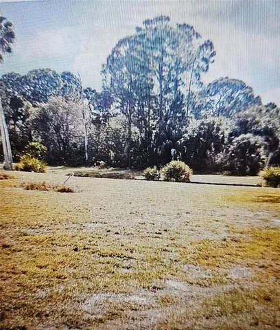 a view of yard covered with snow