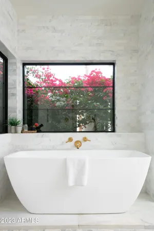 a view of a living room with a flat screen tv