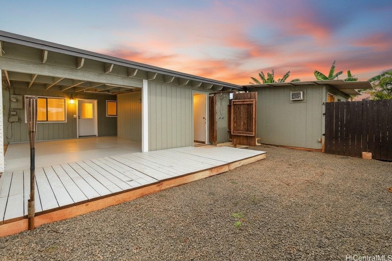 4806 Iiwi Road Kapaa, HI 96746 - Photo 11 of 25 view of a house with a backyard