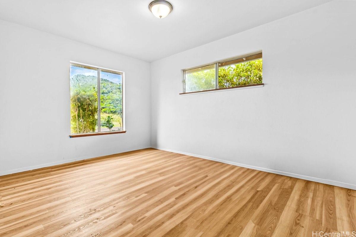 4806 Iiwi Road Kapaa, HI 96746 - Photo 6 of 25 an empty room with windows