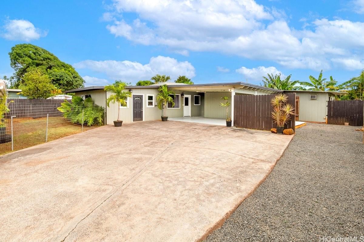 4806 Iiwi Road Kapaa, HI 96746 - Photo 9 of 25 view of a house with a patio