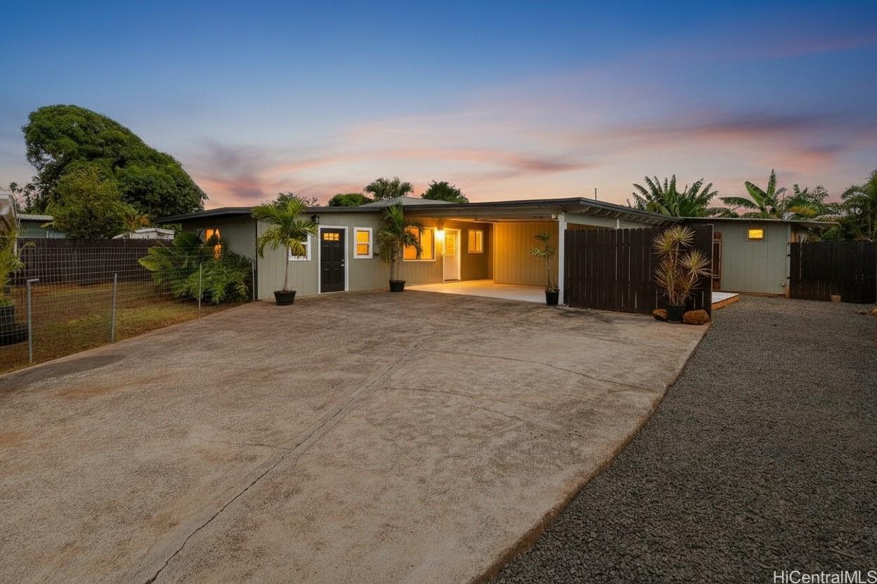 4806 Iiwi Road Kapaa, HI 96746 - Photo 10 of 25 a view of a house with a yard