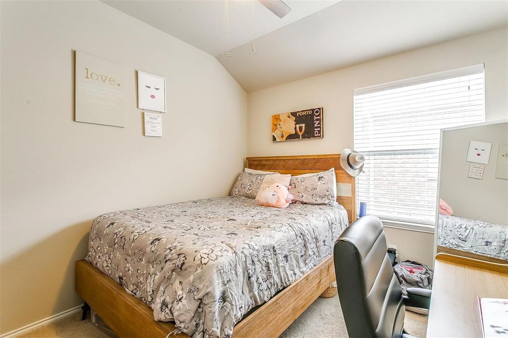 1629 Ridge Creek Lane Aubrey, TX 76227 - Photo 15 of 25 Bedroom featuring vaulted ceiling, carpet floors, and a ceiling fan