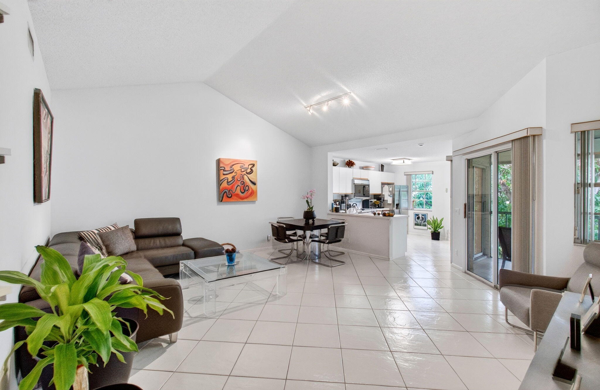 6737 Via Regina Boca Raton, FL 33433 - Photo 2 of 18 LIVING ROOM WITH VAULTED CEILINGS