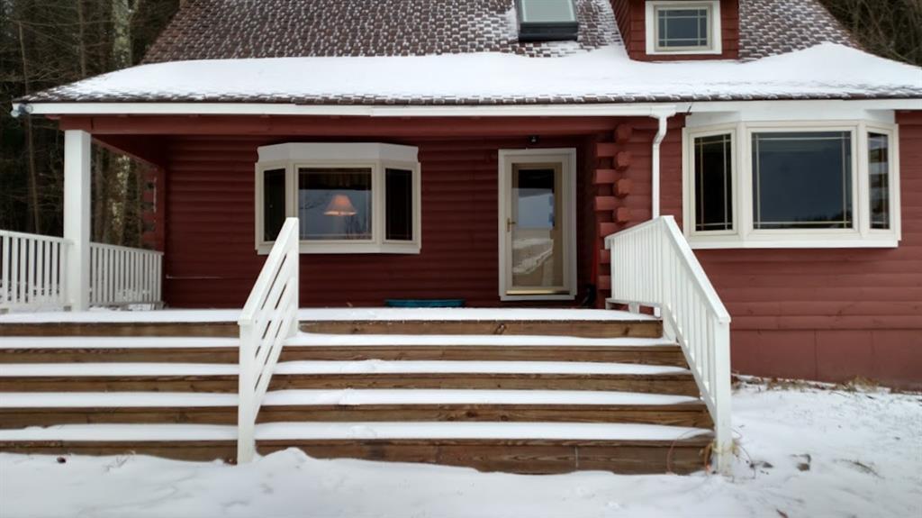 22 Sandy Brook Road Colebrook, CT 06021 - Photo 1 of 1 a front view of a house with a porch