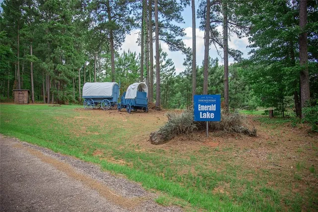 a backyard of a house with oven and outdoor seating