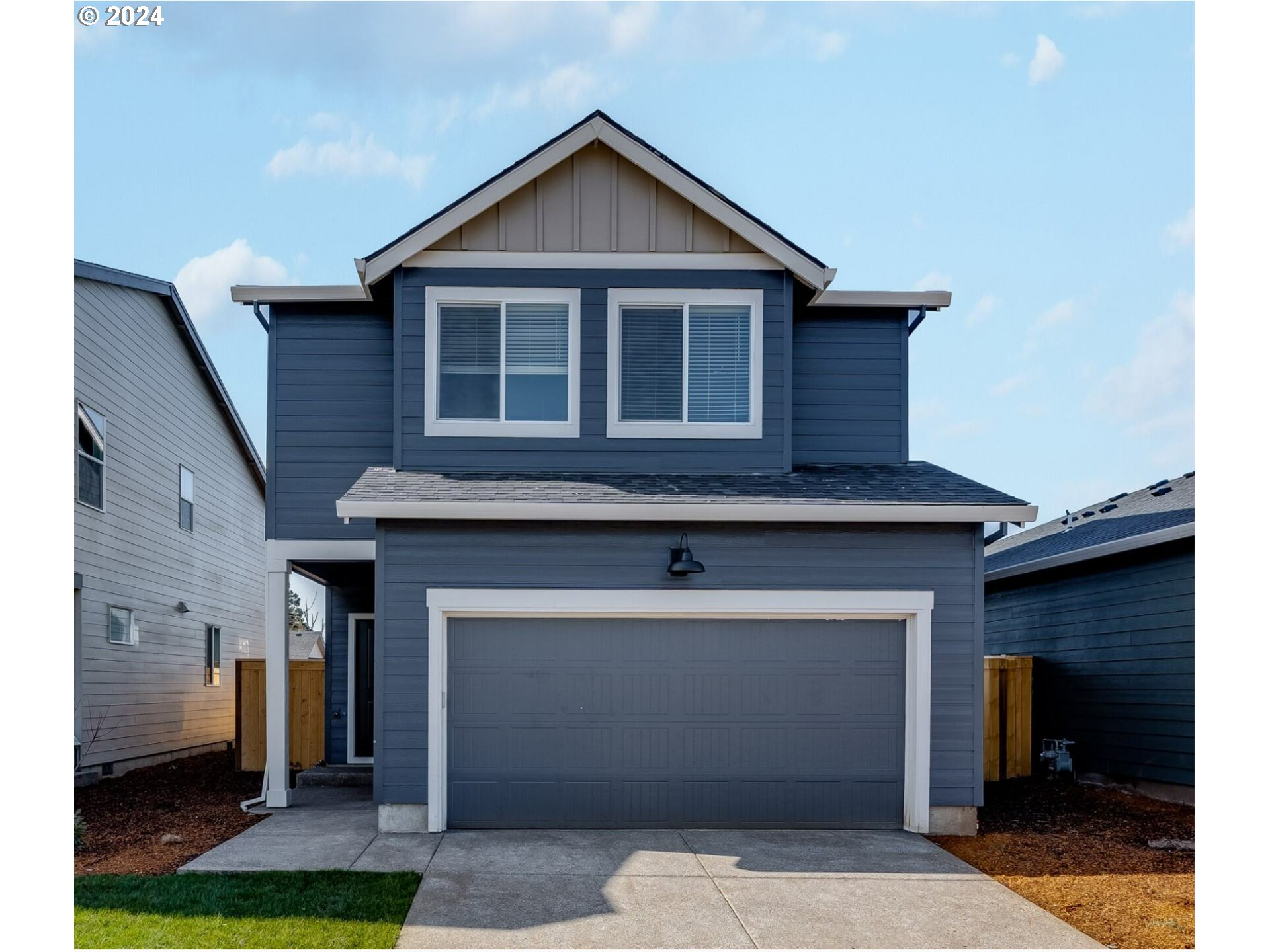 2604 U Street Springfield, OR 97477 - Photo 1 of 19 a front view of a house with a yard
