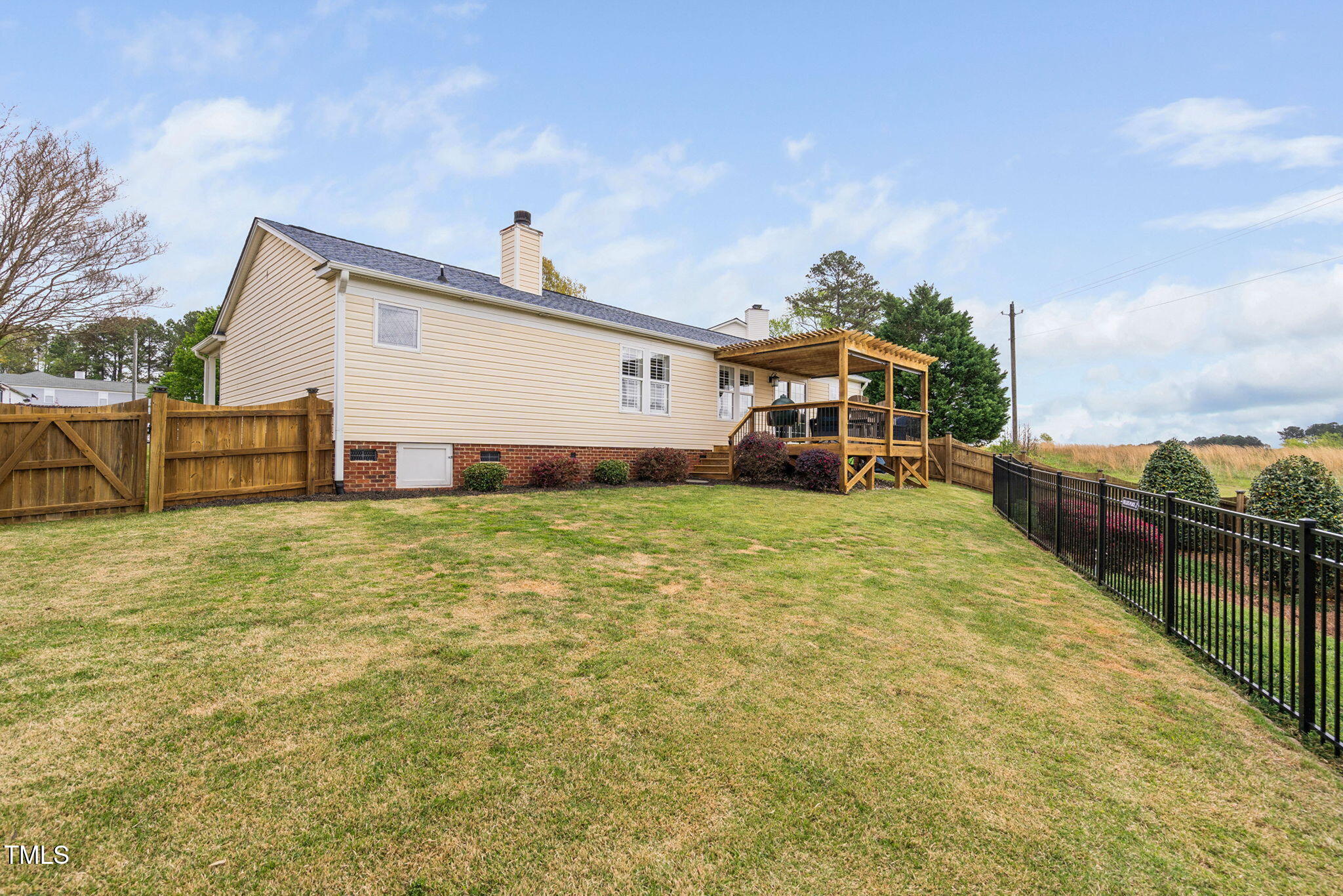 1202 Lexington Ridge Lane Apex, NC 27502 - Photo 32 of 36 backyard and back of house