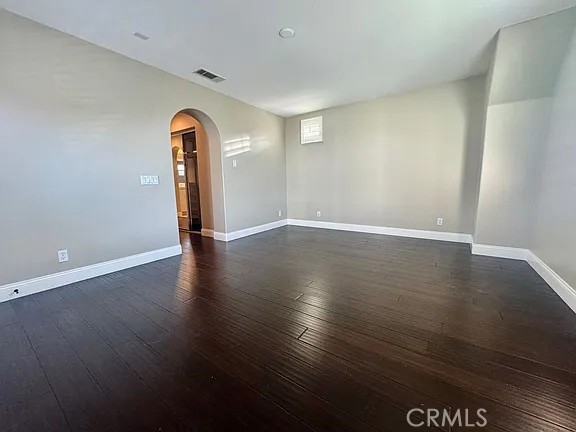 6 Evergreen Road Ladera Ranch, CA 92694 - Photo 13 of 27 an empty room with wooden floor and mirror