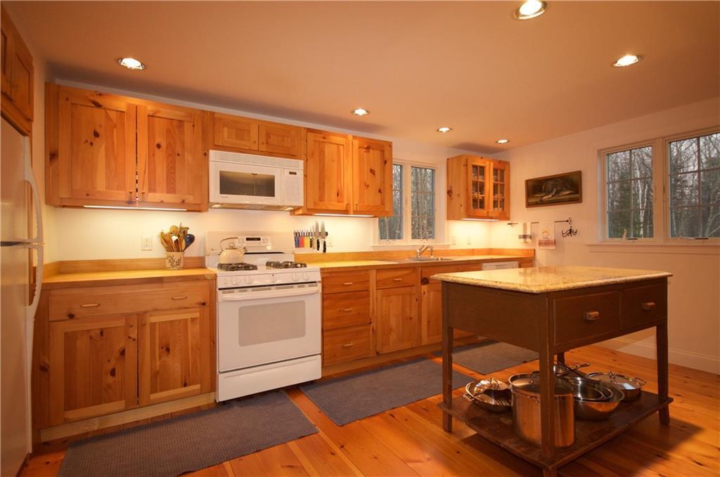 2417 Sennebec Road Appleton, ME 04862 - Photo 9 of 29 Kitchen open to dining room and...