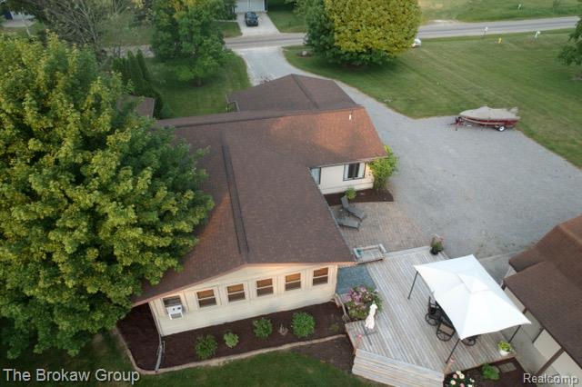 5461 North Henderson Road Davison, MI 48423 - Photo 46 of 64 Extensive outdoor decking with multiple seating areas