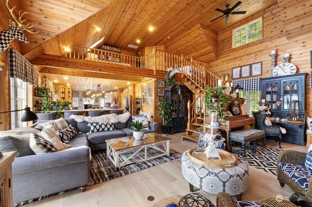 a outdoor living space with patio furniture and a potted plant