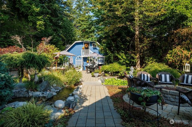 a view of a patio with furniture and table
