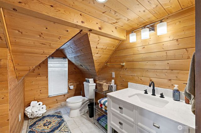 a bathroom with a sink and a shower