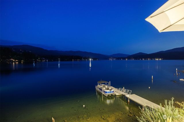 a view of residential houses with outdoor space and swimming pool