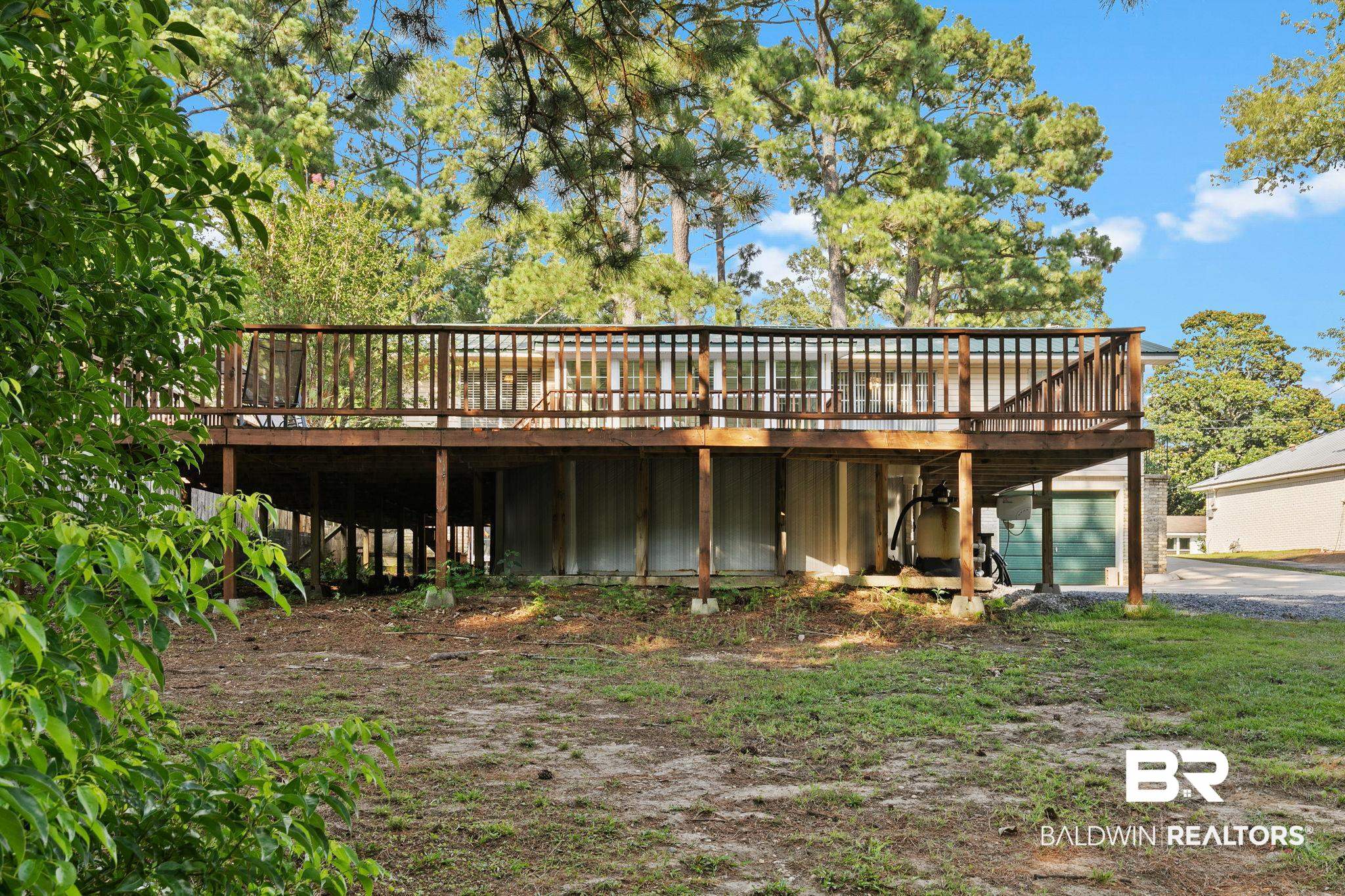 14 Lee Circle Daphne, AL 36527 - Photo 71 of 83 Rear view of house with a deck