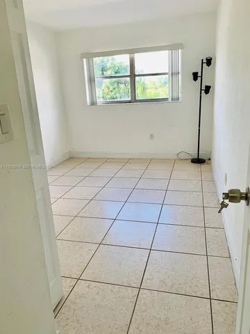 a view of a room & utility room