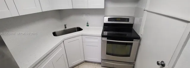 a view of kitchen and microwave