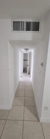 a view of a livingroom with a staircase