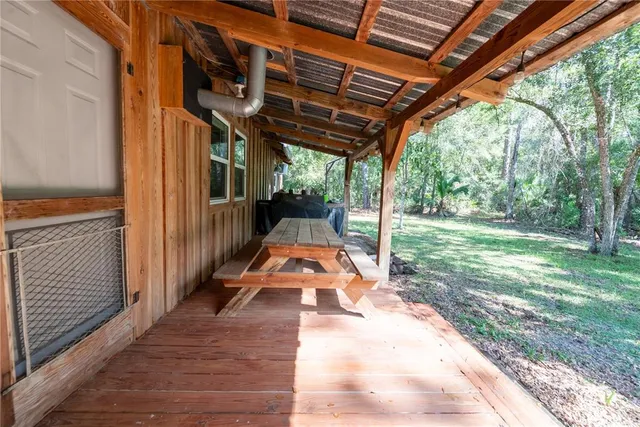 a view of yard with patio