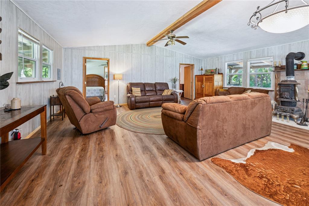 6550 Southwest 100 Court Cedar Key, FL 32625 - Photo 23 of 41 a living room with furniture and a window
