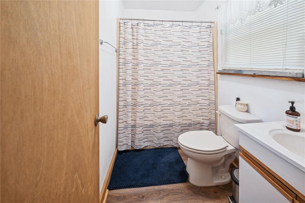 6550 Southwest 100 Court Cedar Key, FL 32625 - Photo 30 of 41 a bathroom with a toilet and a sink