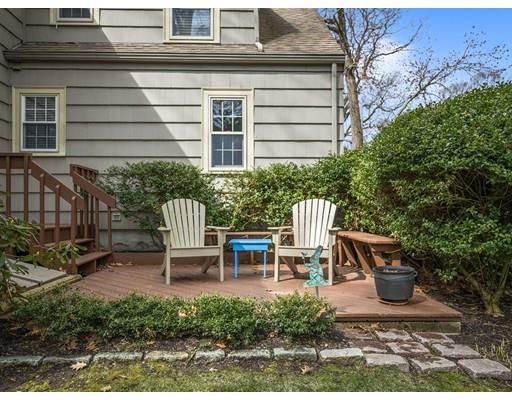 47 Kenilworth Road Wellesley, MA 02482 - Photo 23 of 25 a view of a chair and bench in the backyard