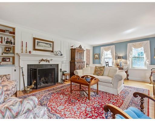 47 Kenilworth Road Wellesley, MA 02482 - Photo 3 of 25 a living room with furniture and a fireplace