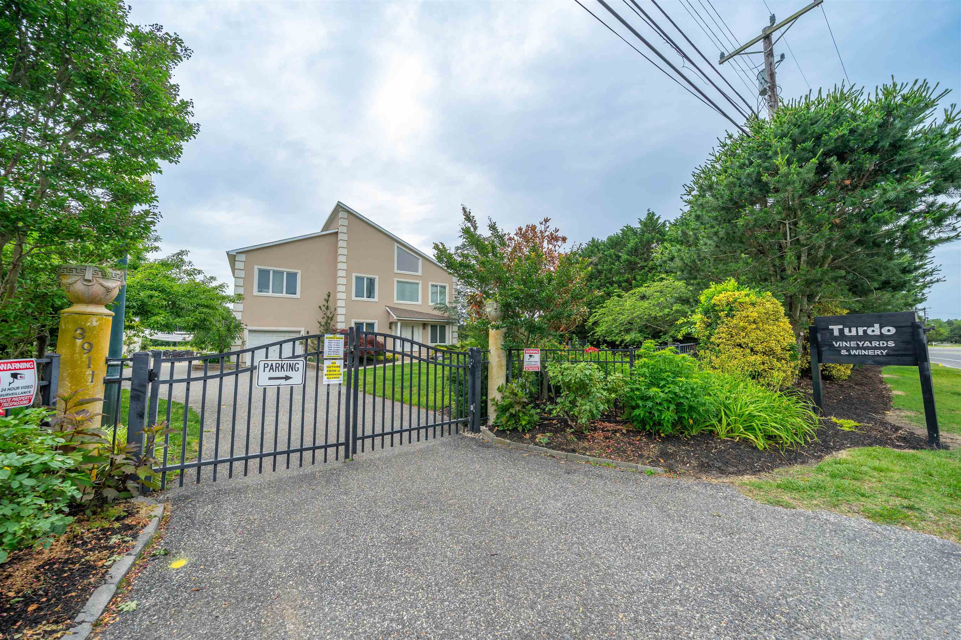 3911 Bayshore Road North Cape May, NJ 08204 - Photo 2 of 44 a view of a house with a small yard and plants