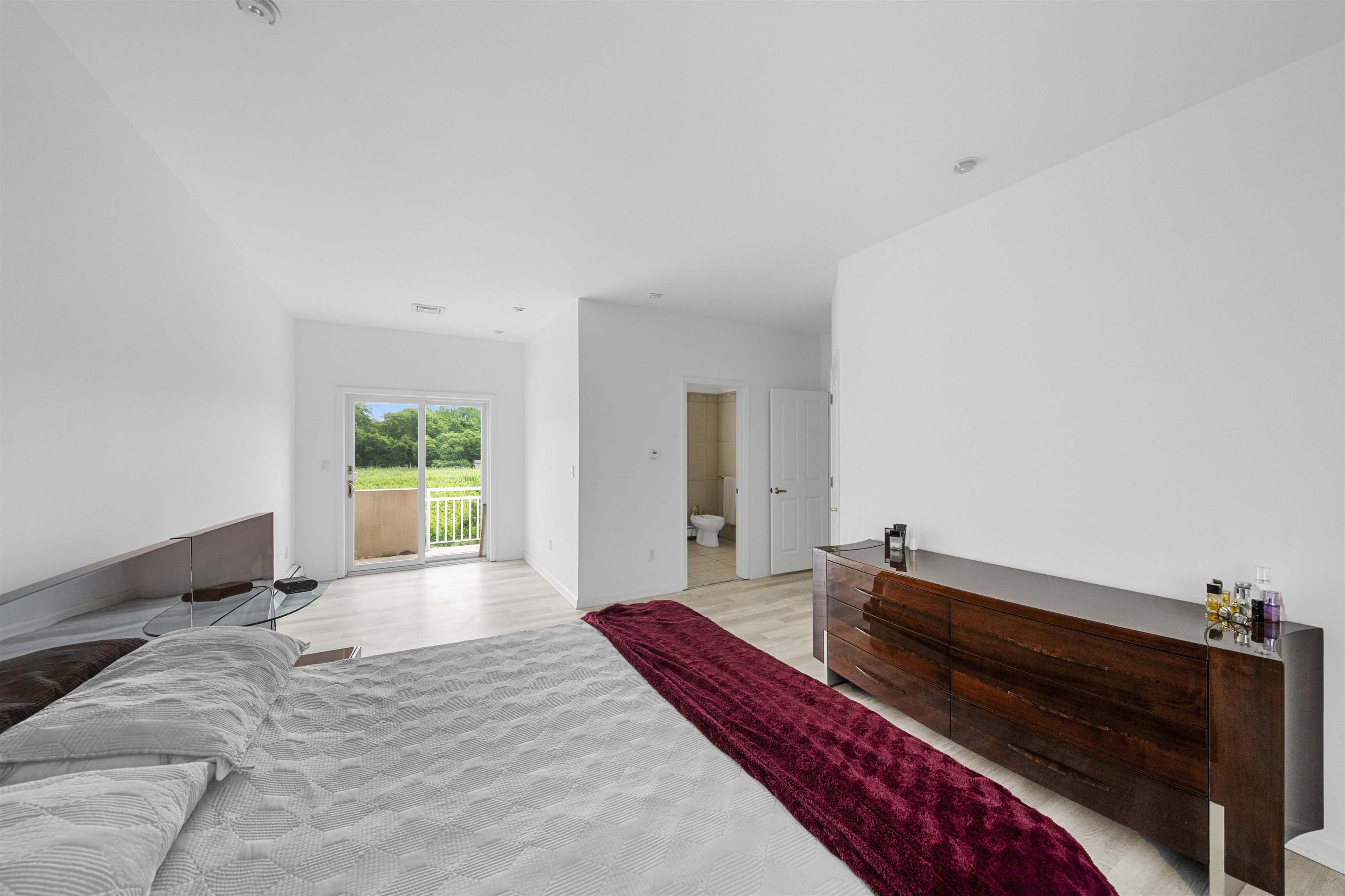 3911 Bayshore Road North Cape May, NJ 08204 - Photo 25 of 44 a bedroom with a bed and a window