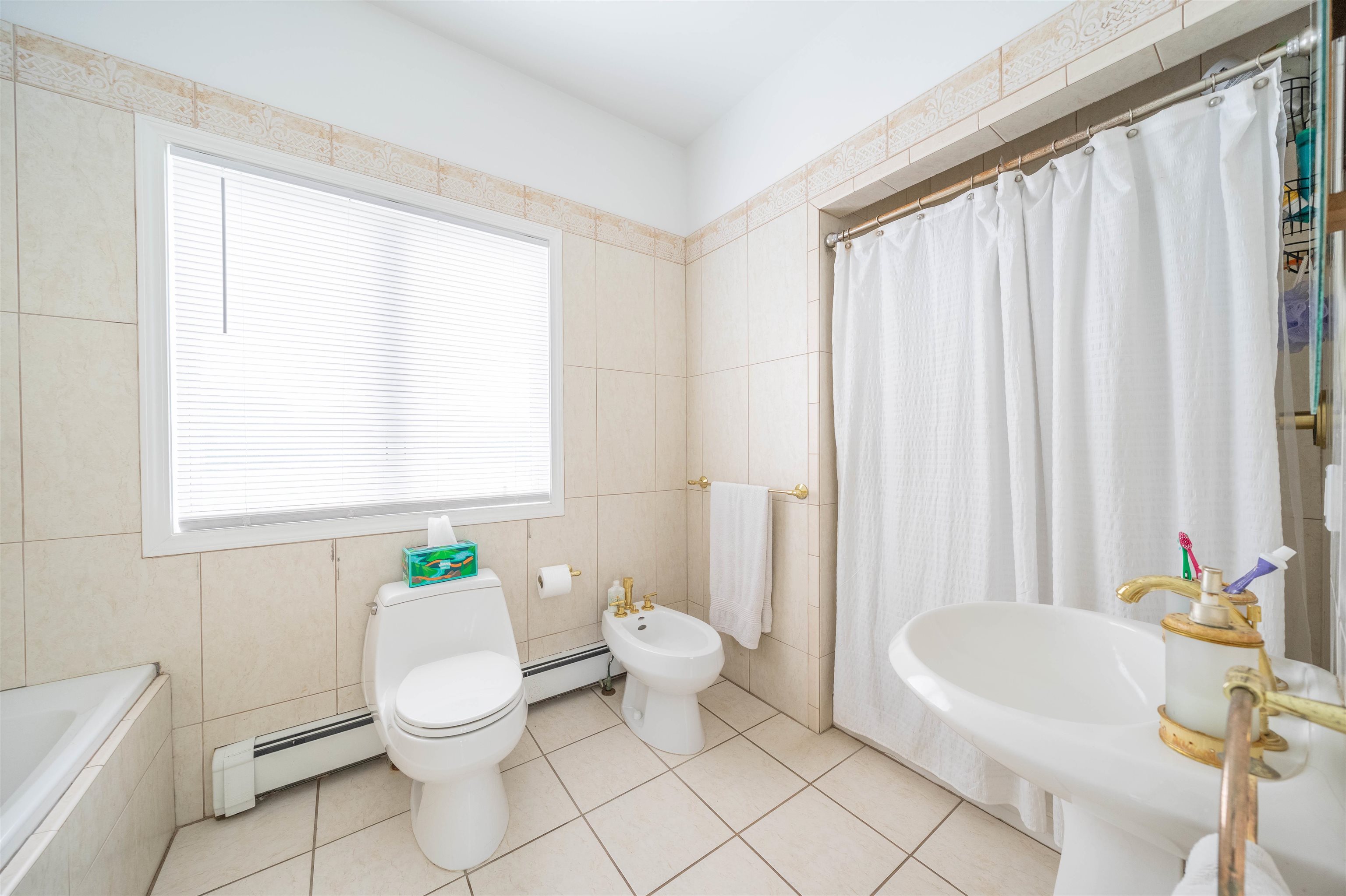 3911 Bayshore Road North Cape May, NJ 08204 - Photo 26 of 44 a bathroom with a sink toilet and shower