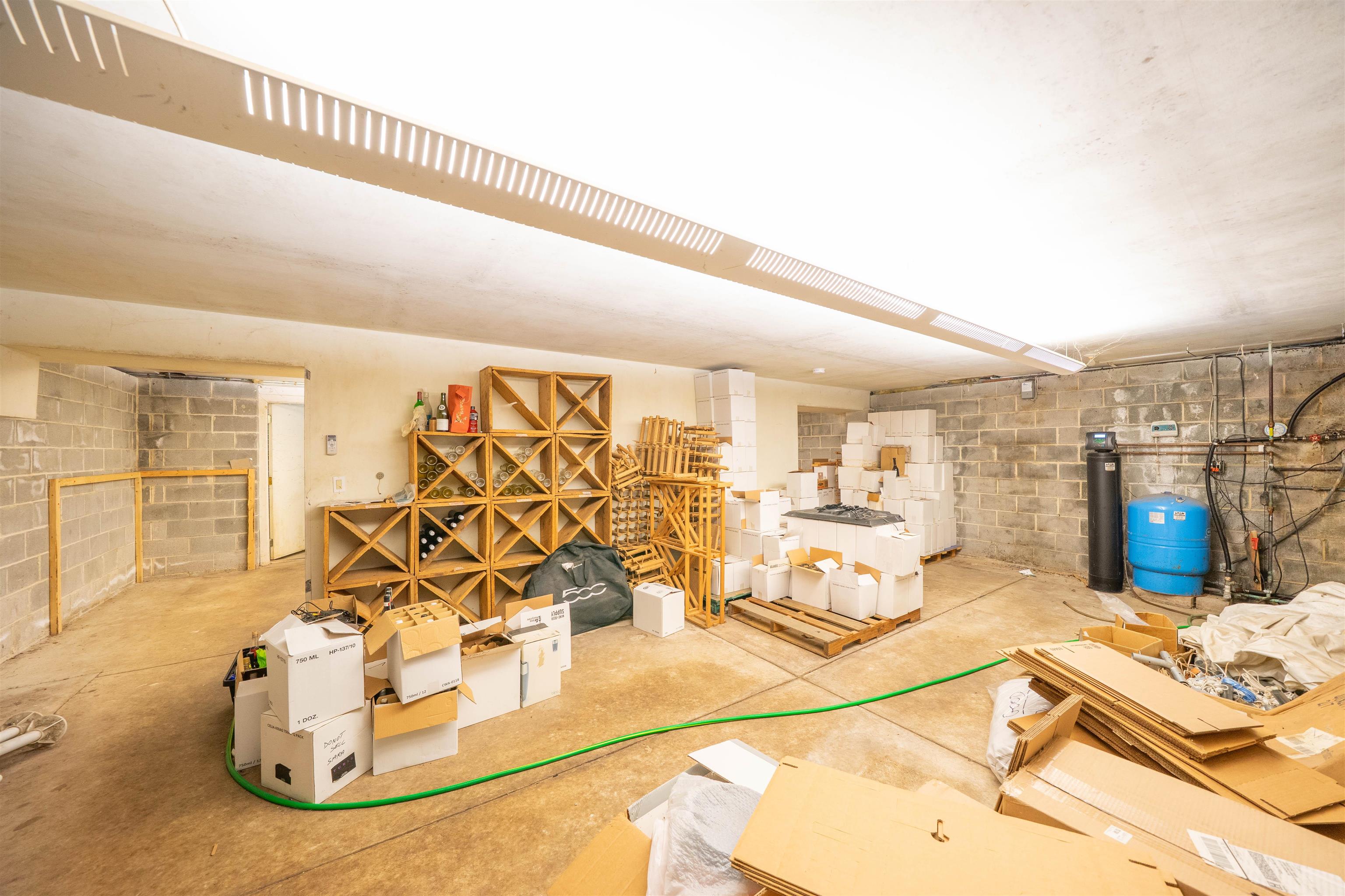 3911 Bayshore Road North Cape May, NJ 08204 - Photo 28 of 44 a living room with furniture and a floor to ceiling window