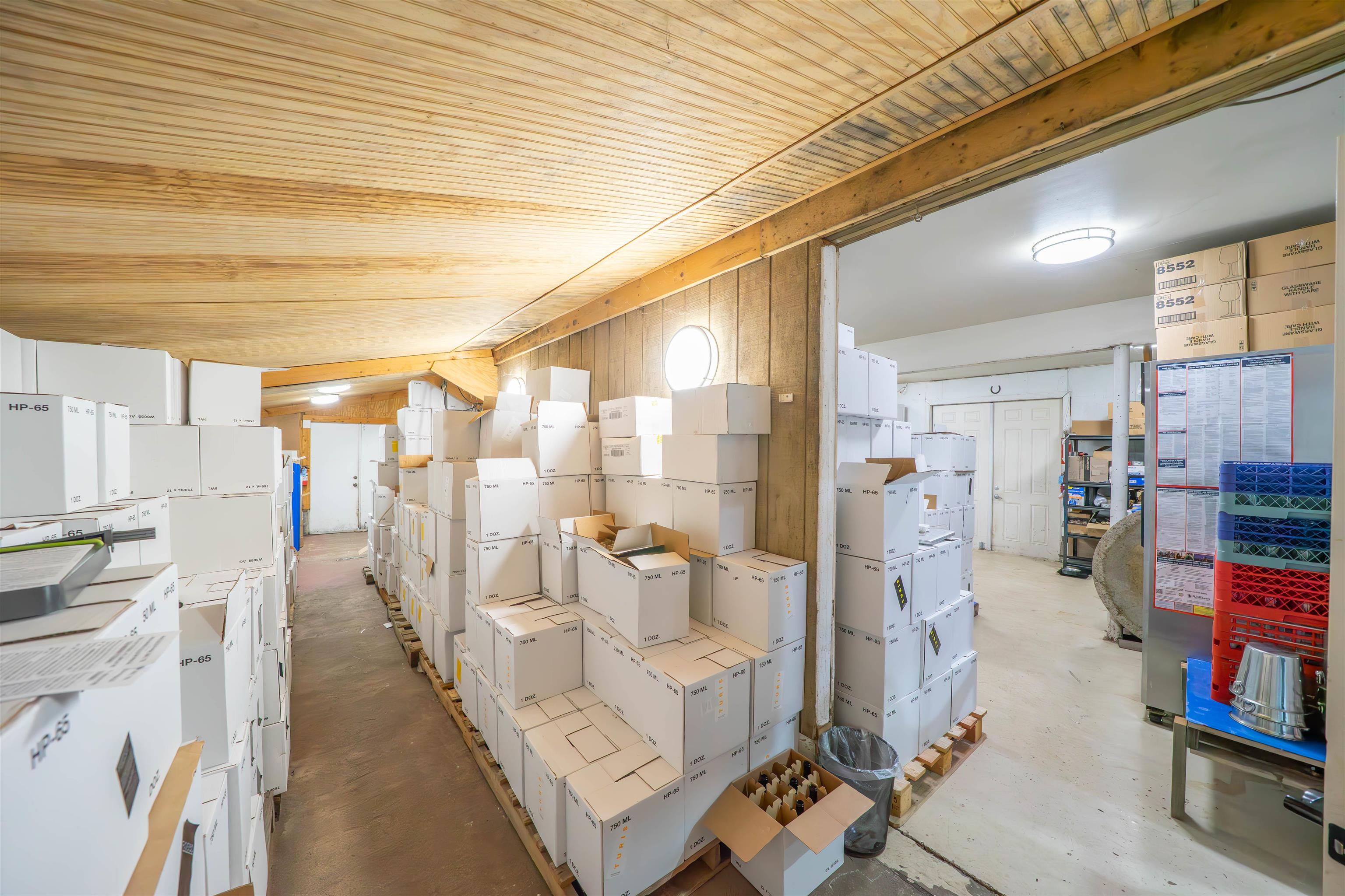 3911 Bayshore Road North Cape May, NJ 08204 - Photo 31 of 44 a living room with lots of furniture and a wooden floor
