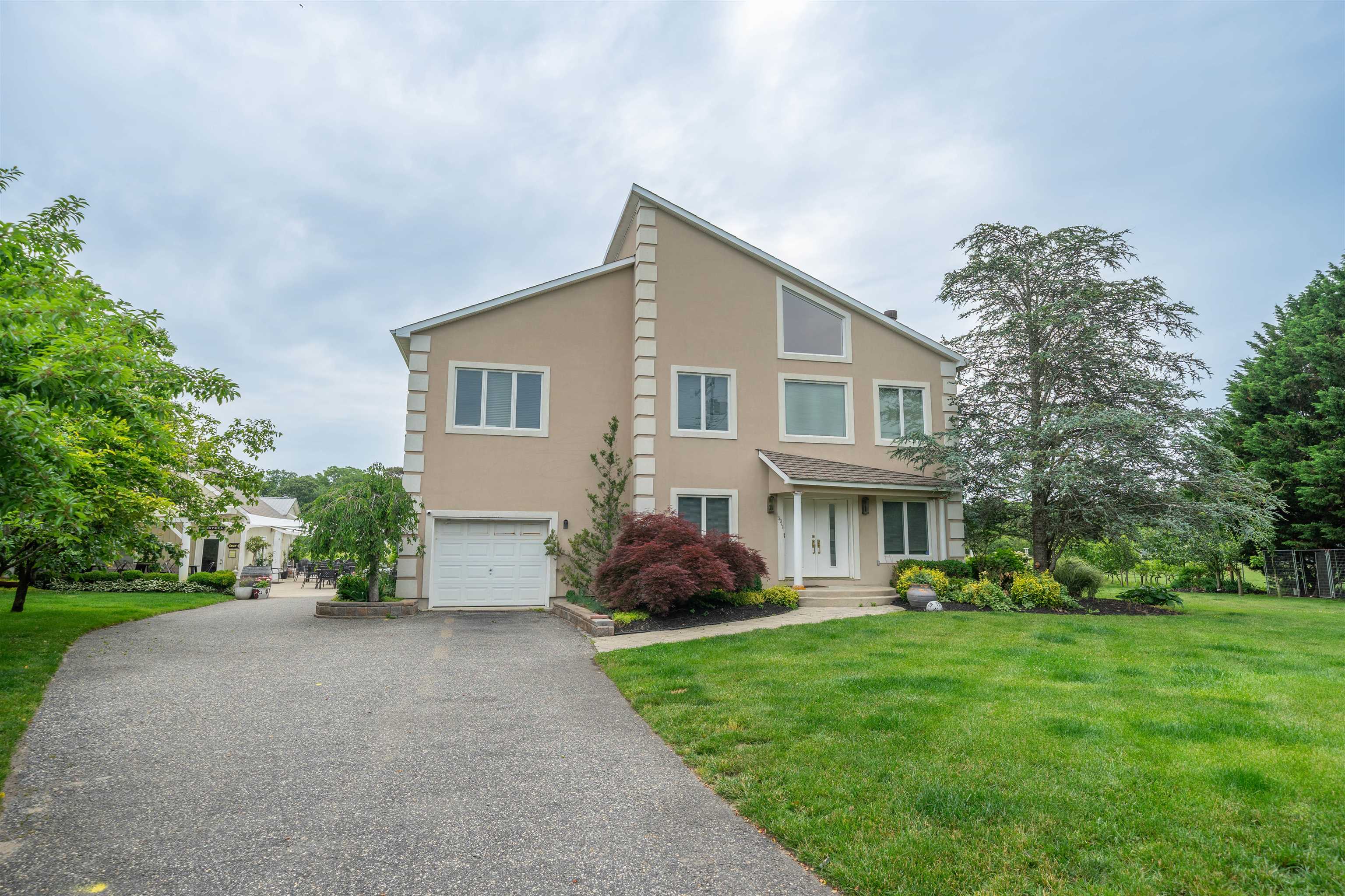 3911 Bayshore Road North Cape May, NJ 08204 - Photo 44 of 44 a front view of house with yard and green space