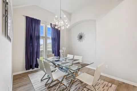 a view of entryway with wooden floor