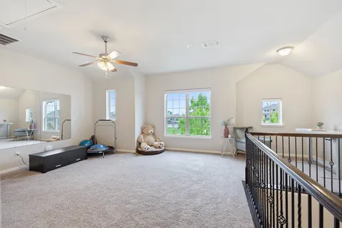 a bathroom with a sink toilet a mirror and shower