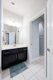 a bathroom with a toilet and a bathtub